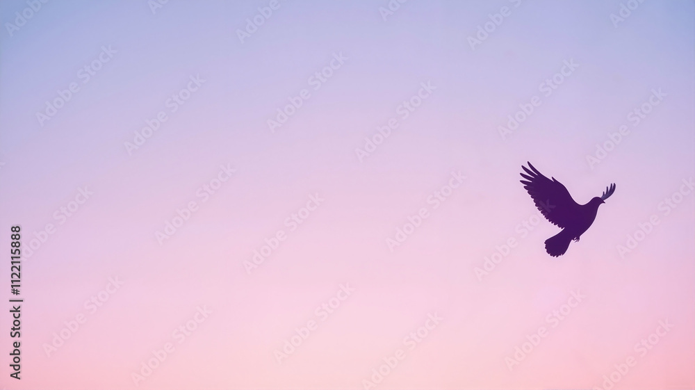 Fototapeta premium Bird flying in pink and purple sky
