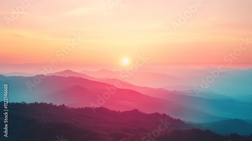 Stunning sunset over misty mountain landscape. photo