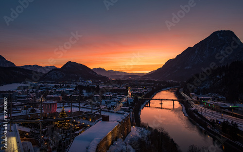 Winter sunset view from castle Kufstein over the Alps, river Inn and Christmas Market, Austria