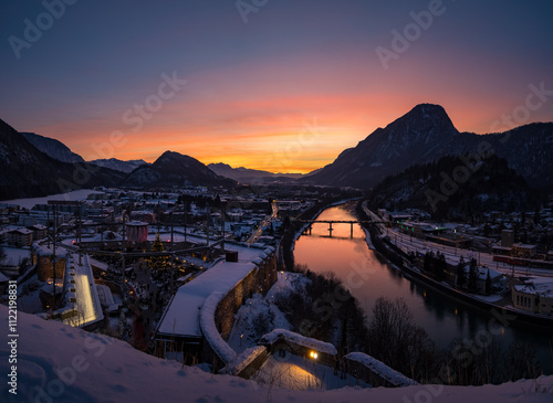 Winter sunset view from castle Kufstein over the Alps, river Inn and Christmas Market, Austria