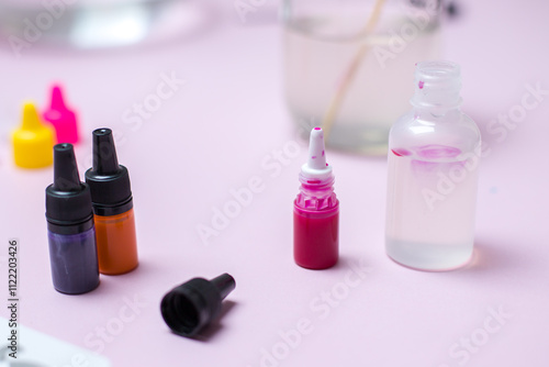 Bottles with water-based paints. Selective focus.