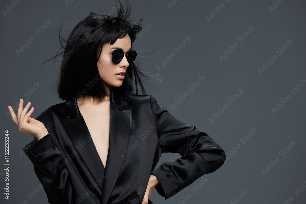 Asian woman, black suit, sunglasses, posing, gray background a stylish asian woman dressed in a sharp black suit and fashionable sunglasses poses confidently against a neutral gray backdrop Asian woman, black suit, sunglasses, posing, gray background a stylish asian woman dressed in a sharp black suit and fashionable sunglasses poses confidently against a neutral gray backdrop