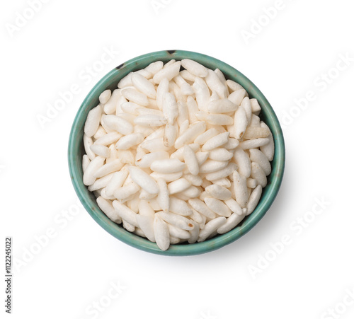 Puffed rice in bowl isolated on white, top view photo