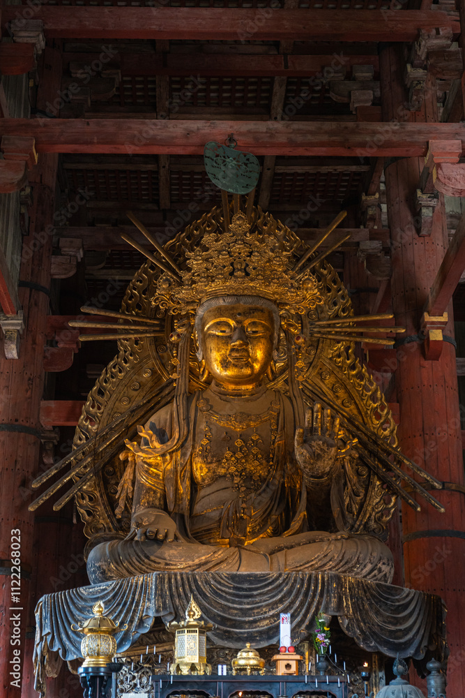 Obraz premium Golden Buddha Statue at Toda-ji Temple, Nara, City of Deer, Japan