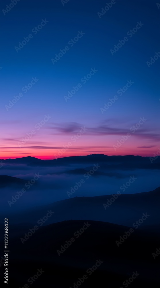 Obraz premium Burgundy and deep blue landscape captures the dreamlike beauty of blue hour