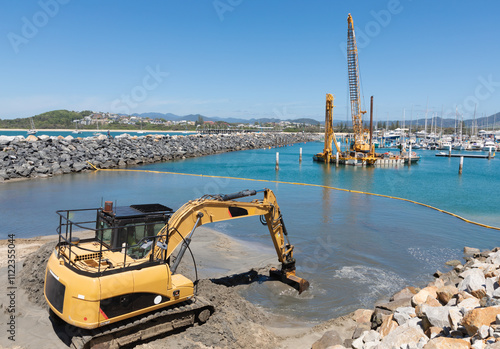Marina Construction - Coffs Harbour NSW Australia. Heavy excavator working to deepen the Marina area.