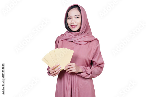 Asian muslim woman giving money envelope for thr or zakat fitrah isolated transparent photo