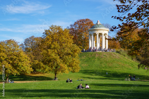 Monopteros in the English Garden (Munich, Bavaria) on a sunny autumn day. The round temple in Greek style stands on a small hill and is one of the most striking landmarks of the city photo