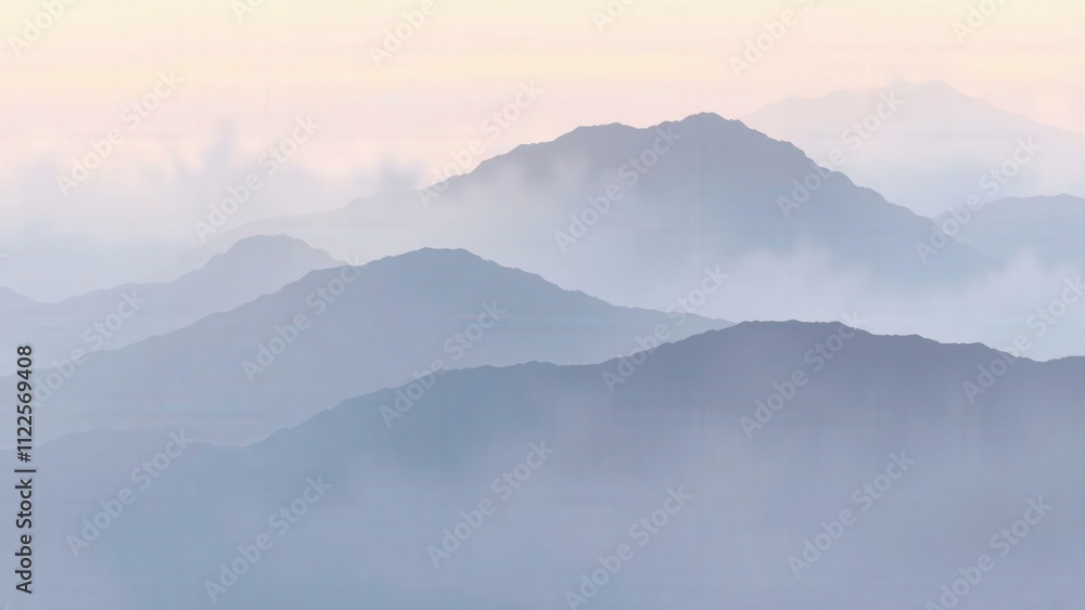 Obraz premium Misty Mountain Silhouettes: A Serene Landscape for Nature Lovers and Interior Design
