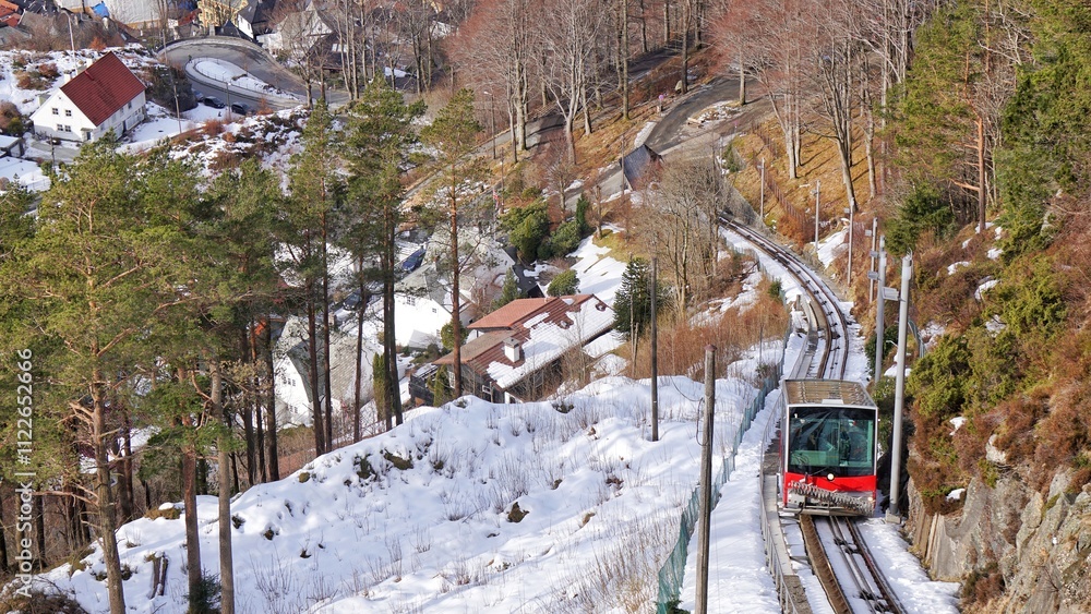 Beautiful tram driving up to mountain.