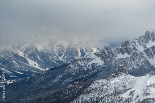 Obraz na płótnie Stormy clouds in italian dolomites in a snowy winter w salonie