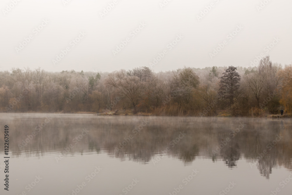 Obraz premium Panorama on the Grube Fernie on a cold, foggy and grey morning in Autumn 2024, Großen-Linden, Hessia, Germany