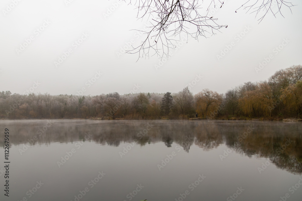 Obraz premium Panorama on the Grube Fernie on a cold, foggy and grey morning in Autumn 2024, Großen-Linden, Hessia, Germany