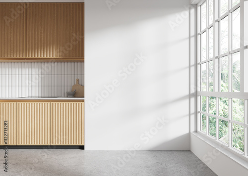 Modern kitchen interior mockup with wooden cabinets, white tiled backsplash, large windows, and blank wall, natural light entering. 3D Rendering photo