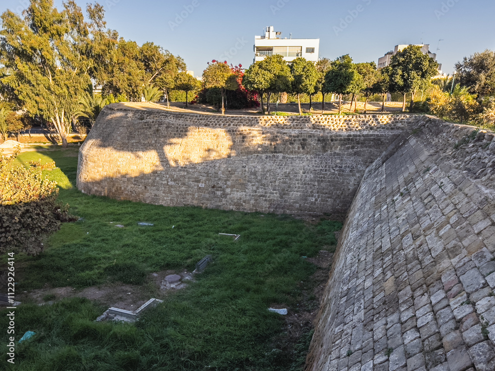 Ancient Stone Wall with Modern City Background