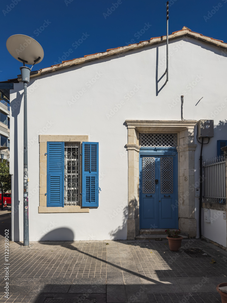Traditional House with Blue Shutters in Urban Limassol