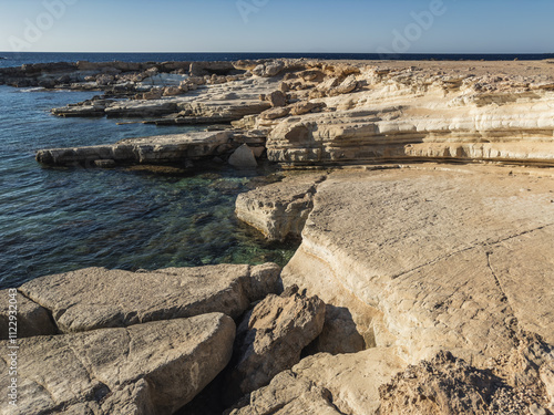 Obraz na płótnie Rocky Cyprus Coastline with Clear Mediterranean Water w salonie