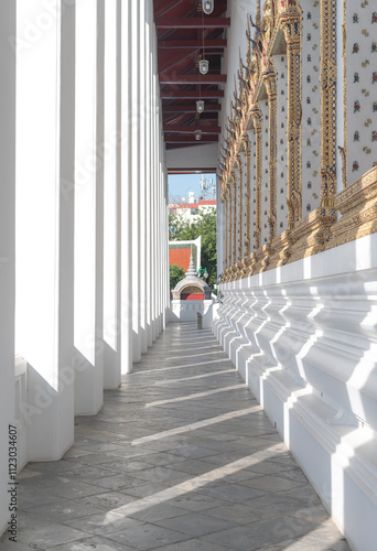 A minimalist-style image of a traditional Thai temple, showcasing clean architectural lines and a simple yet elegant design.