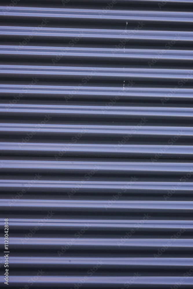 Obraz premium Abstract Background with Horizontal Line Texture. Abstract background featuring wavy horizontal lines in gray and blue tones. Perfect for design projects, presentations, or as a texture for graphic