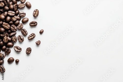 Roasted Coffee Beans Scattered on White Background photo