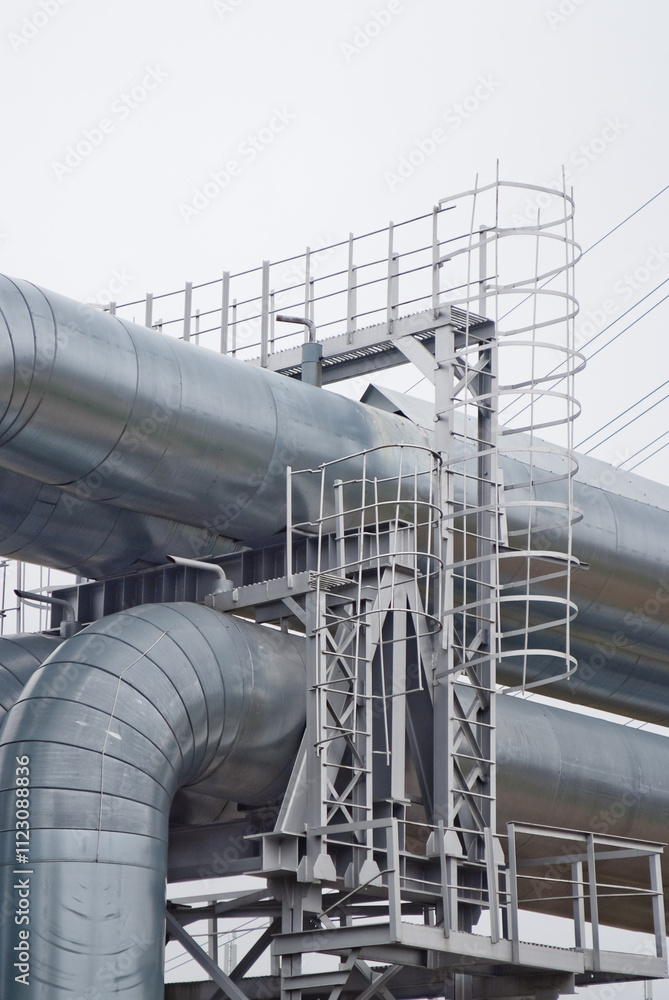 close-up of pipeline against grey sky close-up of pipeline against grey sky
