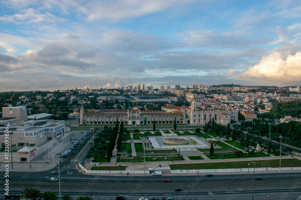 Obraz premium Jerónimos monastery in lisbon, portugal, with surrounding gardens and cityscape