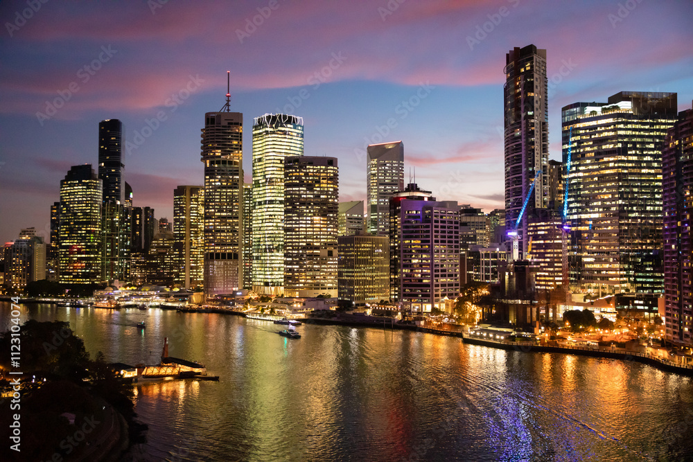 Looking over Brisbane River and the city from the Story Bridge at twilight. Looking over Brisbane River and the city from the Story Bridge at twilight.