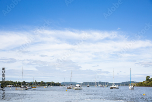 boats moored in Moreton Bay near MacLeay Island in a sunny day photo