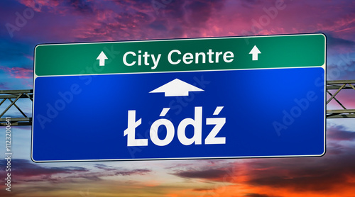 Road sign indicating direction to the city of Lodz, Poland