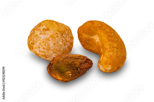 High angle view of roasted crispy salted different nuts isolated on white background with clipping path.