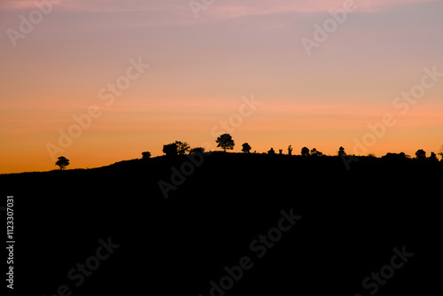 Sunset sinks behind the mountains