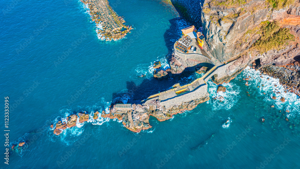 Aerial view of Madeira island. Land meets ocean in Ponta do Sol, Madeira, Portugal