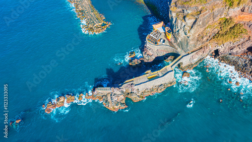 Obraz na płótnie Aerial view of Madeira island. Land meets ocean in Ponta do Sol, Madeira, Portugal w salonie