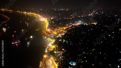 Drone view of Glowing Banaras City During Dev Diwali and Kashi Vishwanath Temple and Gyanvapi Mosque with Ghats