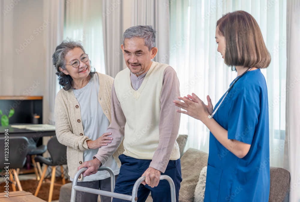 Fototapeta premium senior man using walker walking at home,a nurse caregiver and a wife take care and support beside him,concept for elderly health care,health insurance,home health nursing