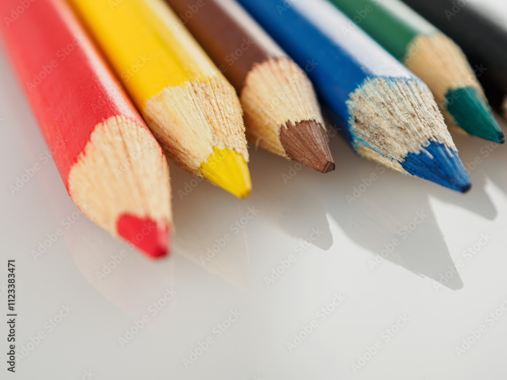 A macro shot of colored pencils showing the vibrant hues and details that inspire creativity and the art of drawing A macro shot of colored pencils showing the vibrant hues and details that inspire creativity and the art of drawing