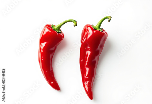 two red peppers isolated on a white background