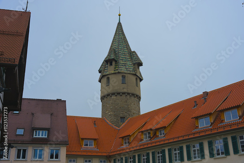 Historic Tower and Colorful Rooftops in a European Town