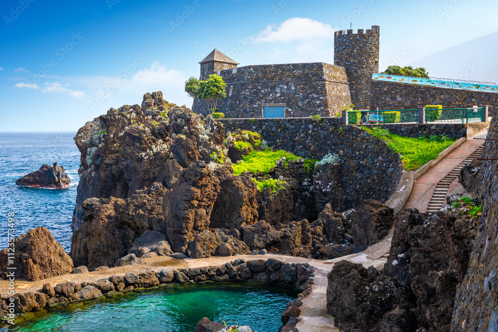 View of the small resort village of Porto Moniz on the Atlantic coast of Madeira Island, Portugal