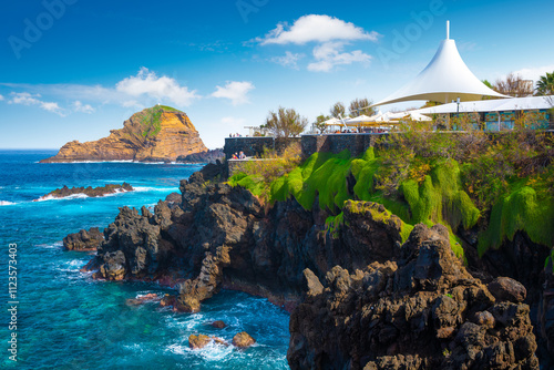 Obraz na płótnie View of the small resort village of Porto Moniz on the Atlantic coast of Madeira Island, Portugal w salonie