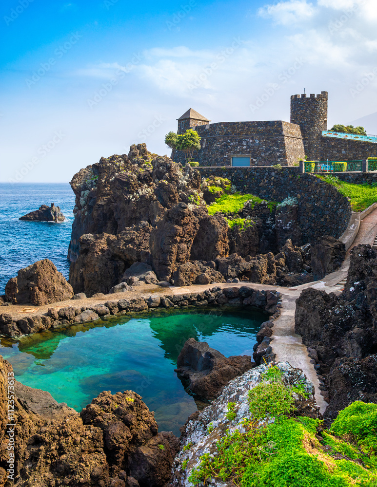 View of the small resort village of Porto Moniz on the Atlantic coast of Madeira Island, Portugal