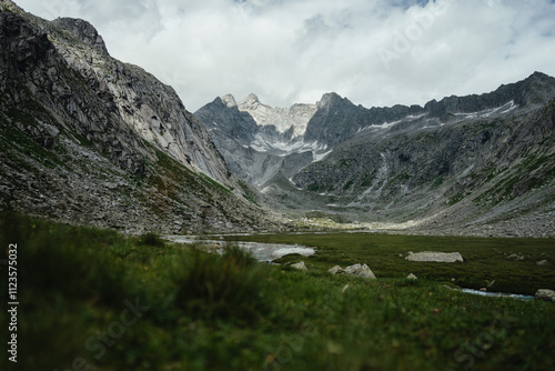 Mountain landscape in the Adamè valley, in the Northern Italy, during a sunny summer day photo