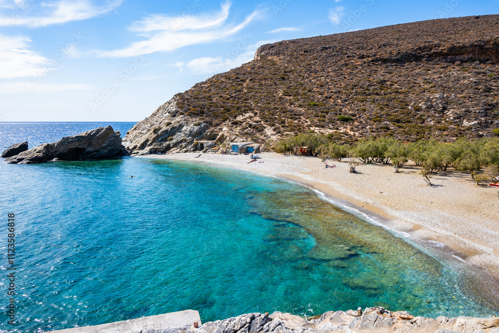 View of stunning sandy Agios Nikolaos beach and azure turqoise sea, Folegandros island, Cyclades, Greece
