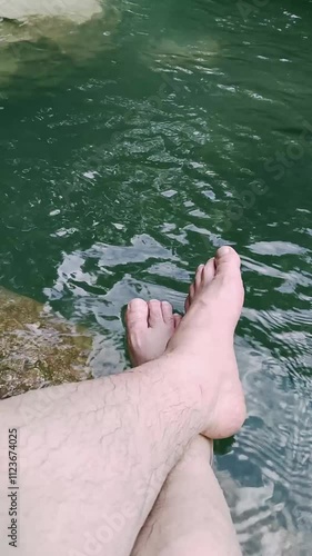 A traveler enjoying freedom and inner peace in magnificent nature