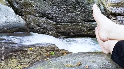 A traveler enjoying freedom and inner peace in magnificent nature