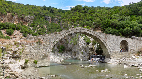 Right below the village of Permet in Albania, lies the famous thermal baths of Benja and the historic Ottoman Katiut Bridge.