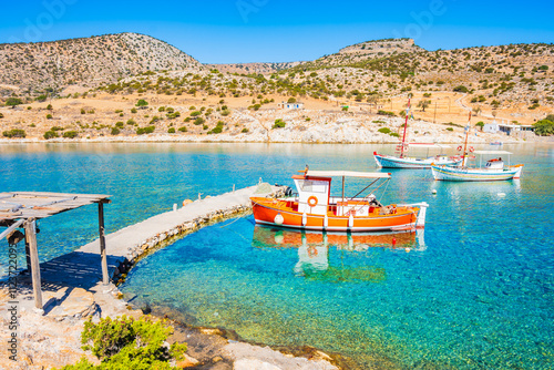 Obraz na płótnie Fishing boats on azure sea and palm trees on idyllic Panormos beach, Naxos island, Cyclades, Greece w salonie