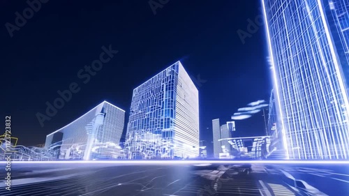 A futuristic city with illuminated skyscrapers in a glowing blue hue, symbolizing innovation, urban development, and cutting-edge architecture. photo