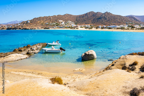 Obraz na płótnie Rocks and stones on idyllic sandy beach of Orkos bay and calm crystal clear azure sea water, Naxos island, Cyclades, Greece w salonie