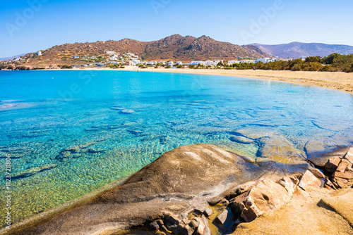 Obraz na płótnie Rocks and stones on idyllic sandy beach of Orkos bay and calm crystal clear azure sea water, Naxos island, Cyclades, Greece w salonie
